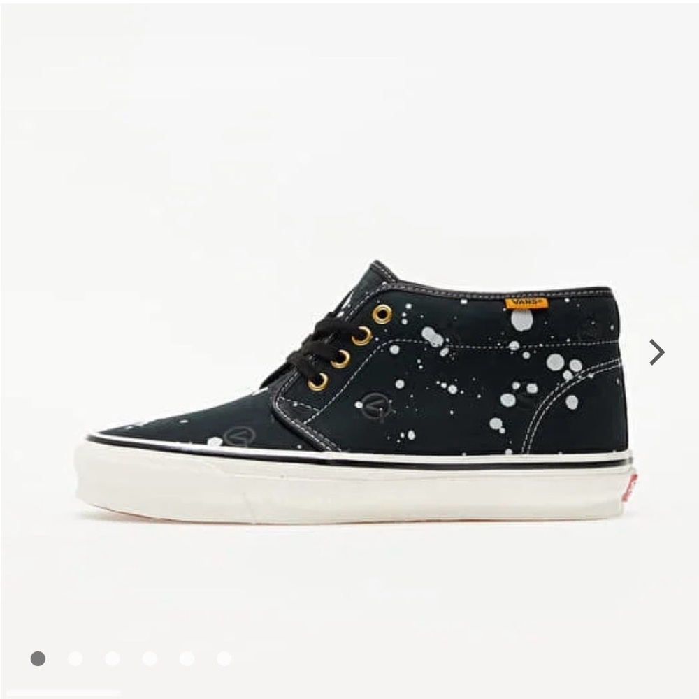 Vans Black and White Mid-Top Sneakers